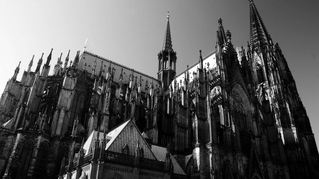 Majestic Cologne Cathedral B&W Wallpaper: Gothic Architecture Background