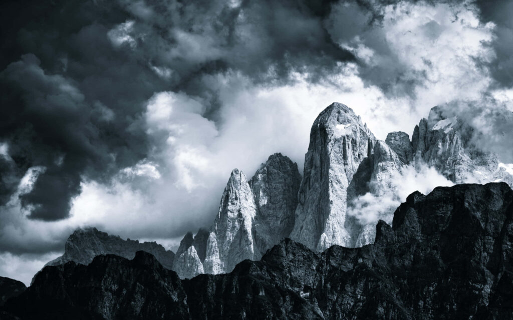 Monochrome Mountain Range Wallpaper: Dramatic Peaks & Clouds