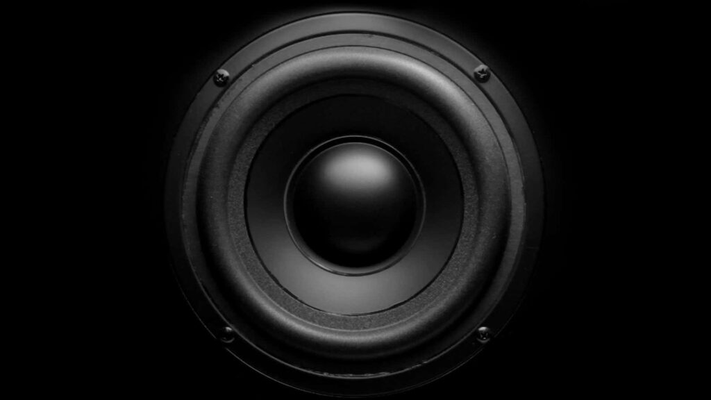 Intricate Monochrome Music Speaker Illustration on Dark Background Wallpaper