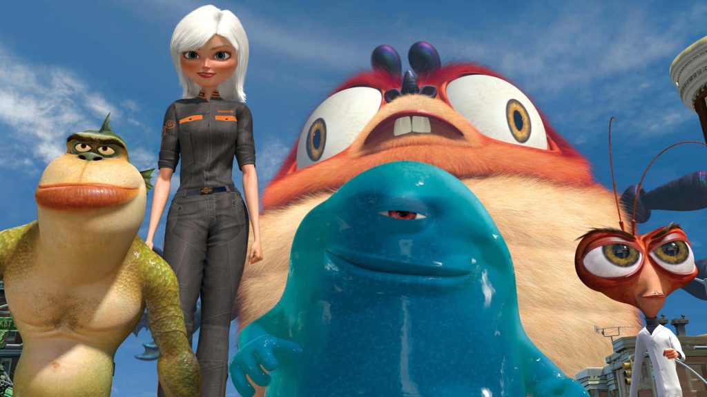 Monsters vs Aliens 3D wallpaper with Ginormica and team against bright blue sky background