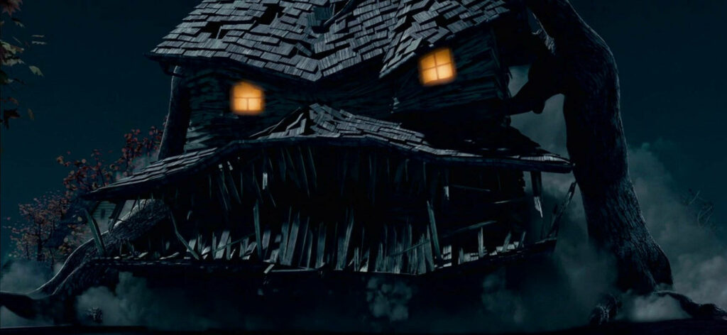 The Sinister Gaze: A Captivating Still from Monster House Reveals the Eerie Haunted Dwelling Amidst a Mysterious Darkness, with Piercing Window Eyes Wallpaper