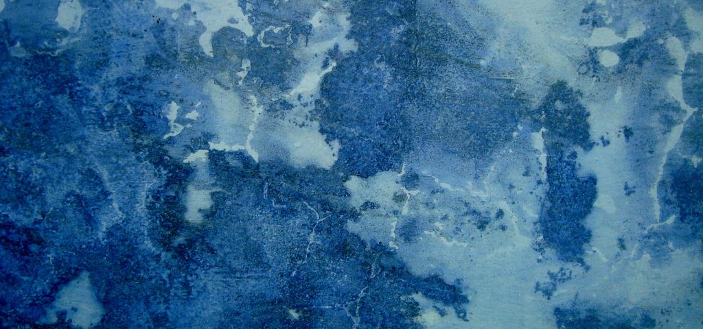 Abstract blue distressed paint texture wallpaper with navy and white tones for digital backgrounds