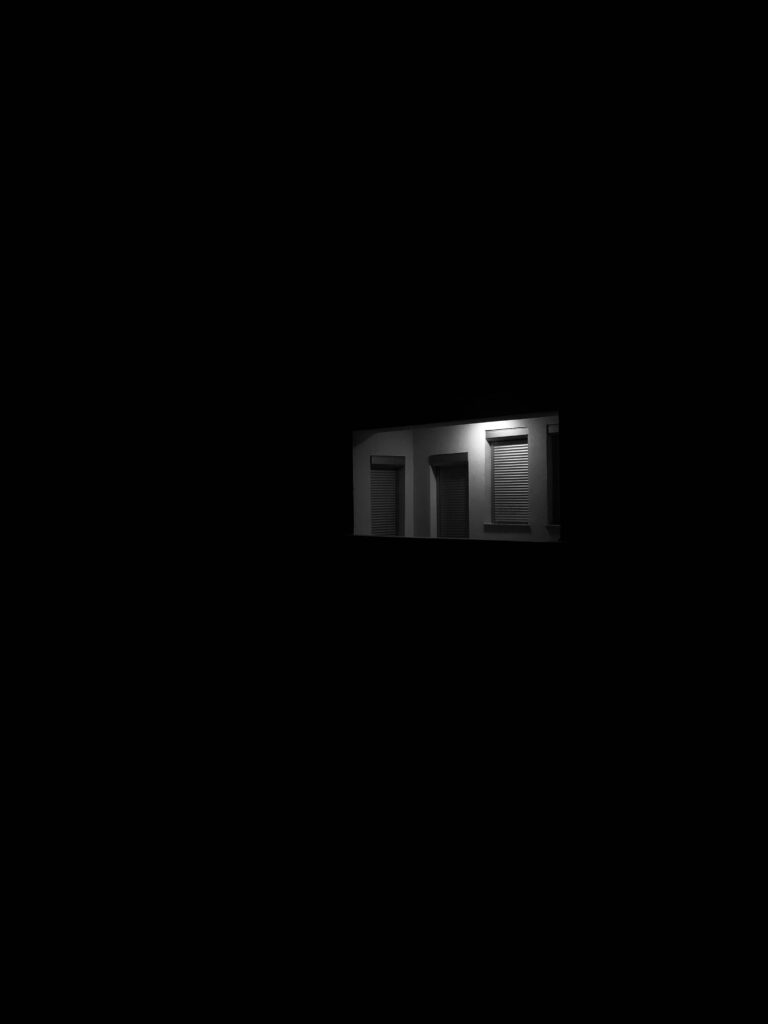 Moody Minimalist Wallpaper: Dim Wall & Windows in Dark Atmosphere