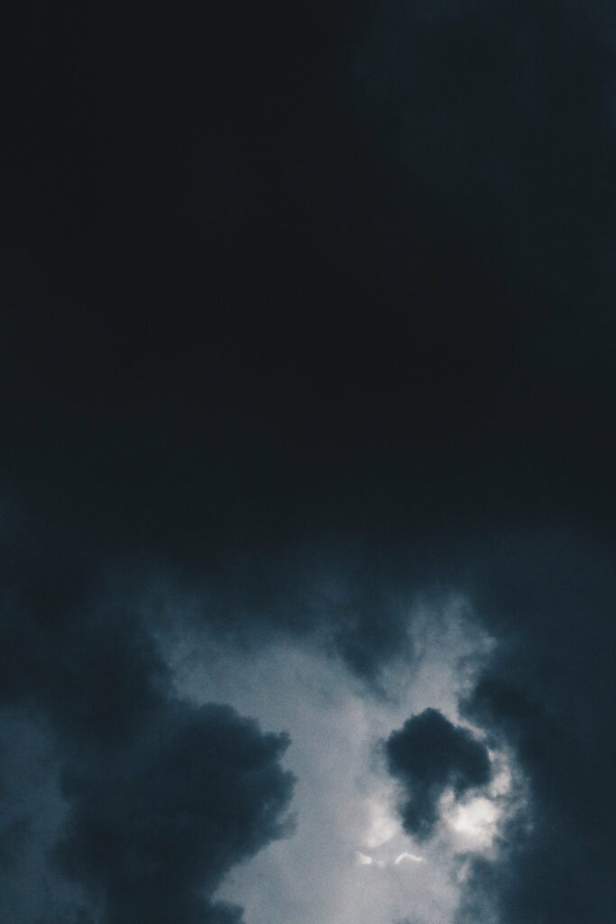 HD Stormy Sky Wallpaper: Moody Clouds & Dramatic Light Background