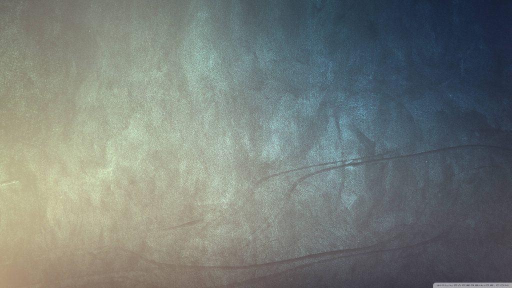Textured concrete surface wallpaper with moody haze and warm to cool gradient minimalist background