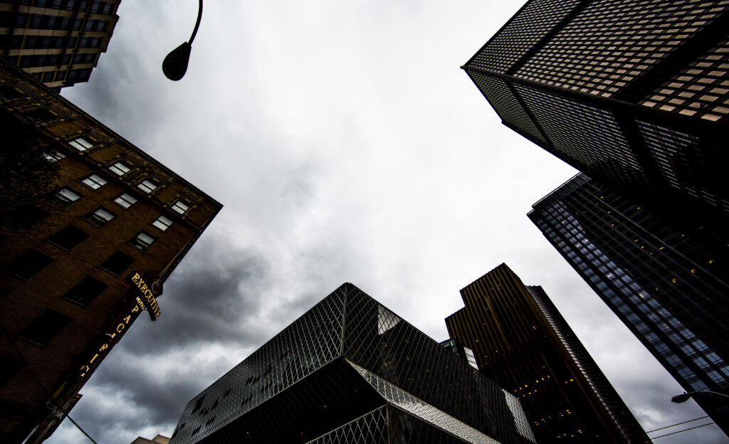 Moody Urban Wallpaper: Towering Buildings & Dramatic Facades