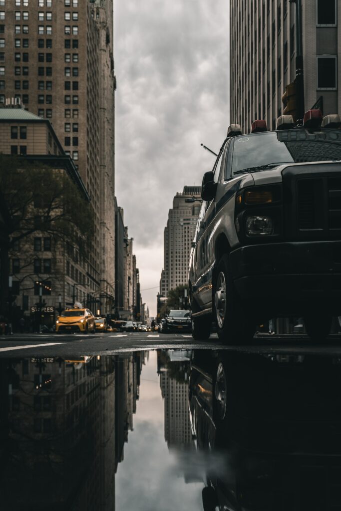 Moody Urban Wallpaper: Reflective Puddles & Overcast Skies