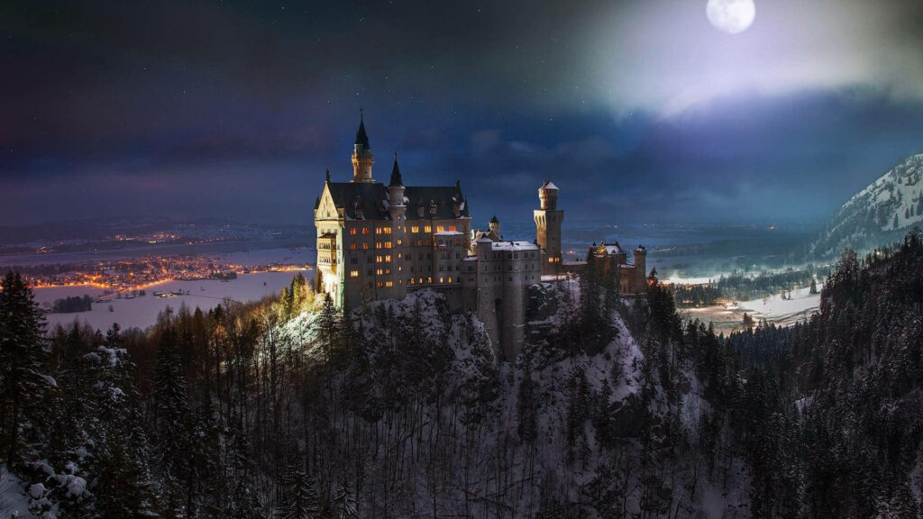 Neuschwanstein Castle Moonlit Wallpaper: Enchanting Winter Landscape