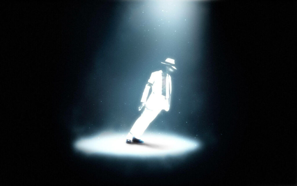 The Ultimate Tribute: Michael Jackson's Gravity-Defying Lean in Spotlight Wallpaper