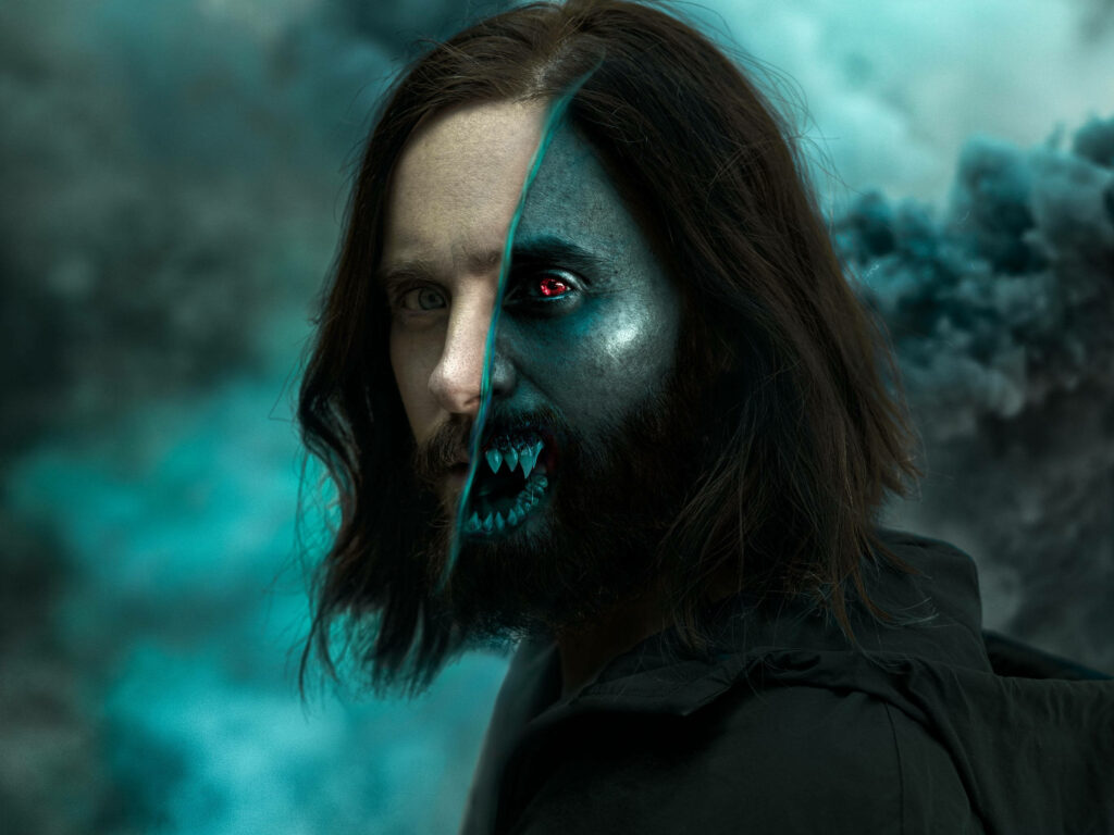 Morbius the Living Vampire split face showing human and vampire forms dark misty wallpaper background