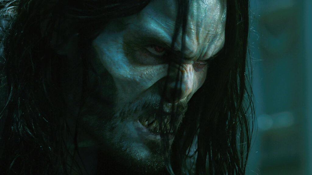 Morbius vampire transformation with glowing red eyes sharp fangs intense menacing expression wallpaper