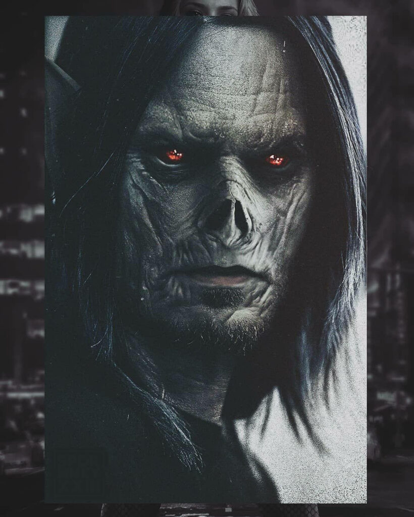 Morbius wallpaper showing vampiric character with glowing red eyes and dark menacing background
