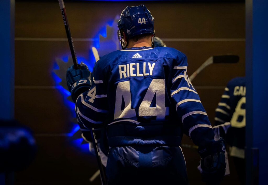 Morgan Rielly Toronto Maple Leafs Jersey Wallpaper: Dramatic Ice Scene