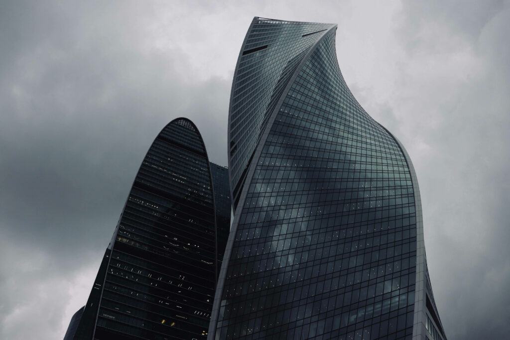 Moscow Evolution Tower silhouette at dusk showcasing modern twisting architecture wallpaper background