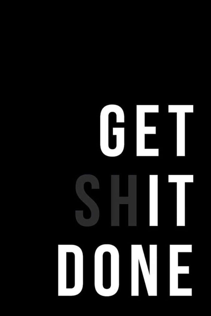Minimalist Get Shit Done wallpaper with bold white and gray text on a black background