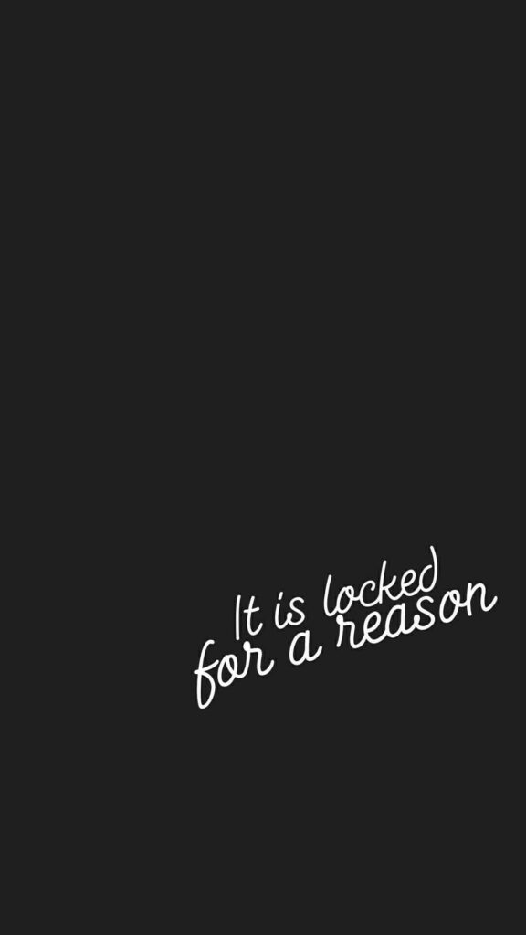 Elegant Black Wallpaper: 'Locked for a Reason' Motivational Design
