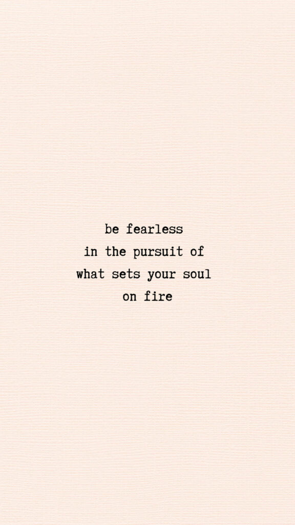 Fearless Pursuit: Minimalistic Motivational Quote Wallpaper