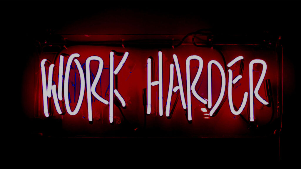 Vibrant Neon Work Harder Wallpaper - Energizing Red & White Design