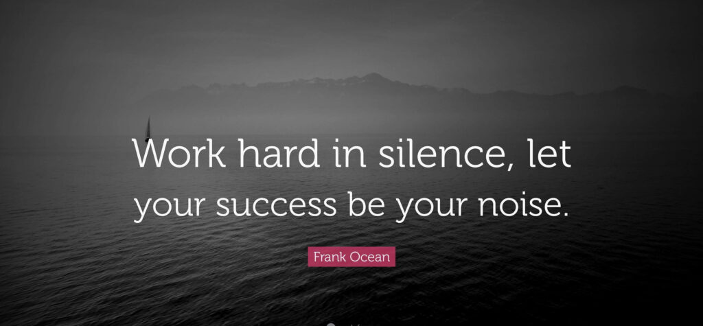 Motivational Wallpaper: Work Hard in Silence Against a Black-and-White Seascape
