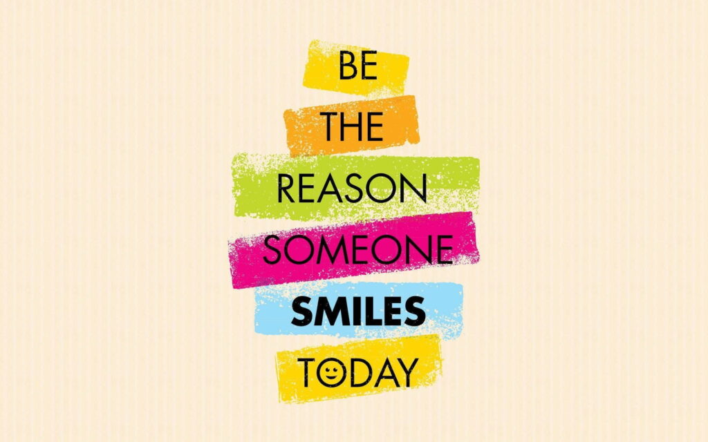 Inspirational wallpaper with Be the reason someone smiles today quote on colorful paint swatches background