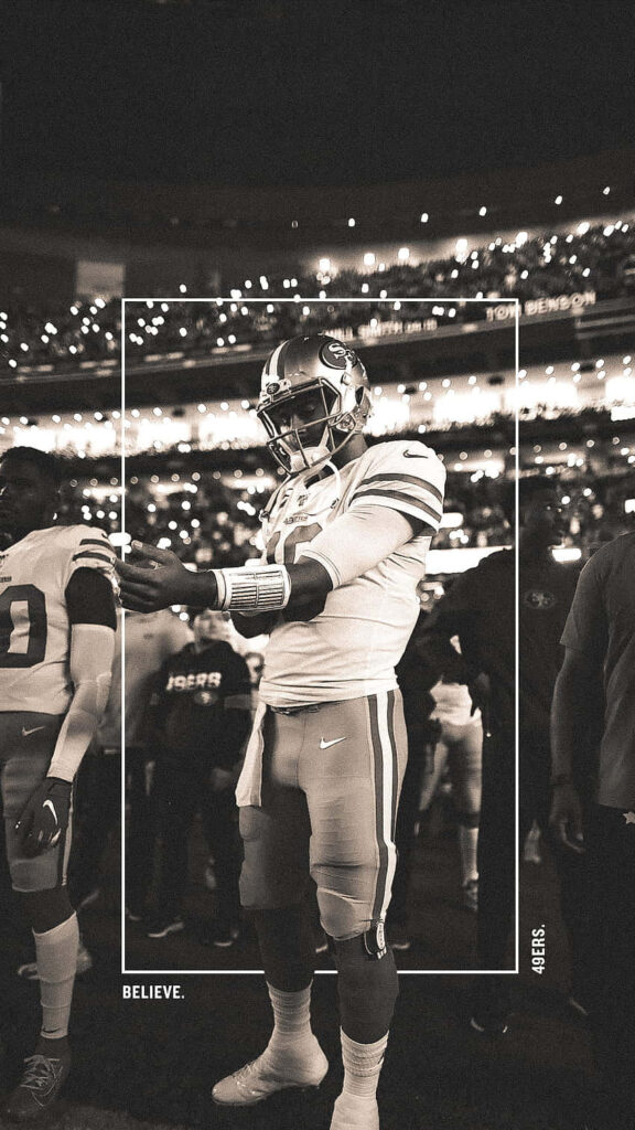 Motivational Football Player Wallpaper: Believe in Your Journey
