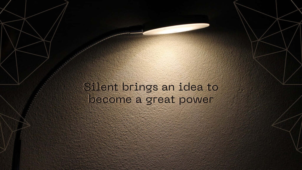 Illuminated Quote Wallpaper: Silent Brings Power Against Dark Wall
