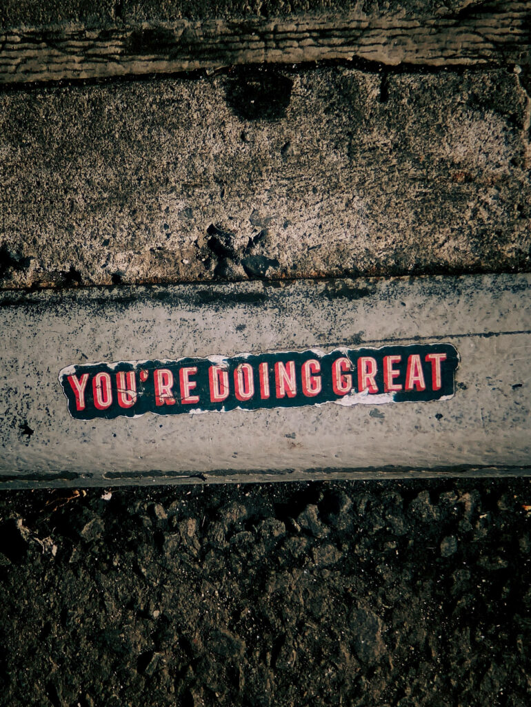 Motivational Wallpaper: 'You're Doing Great' on Rustic Background