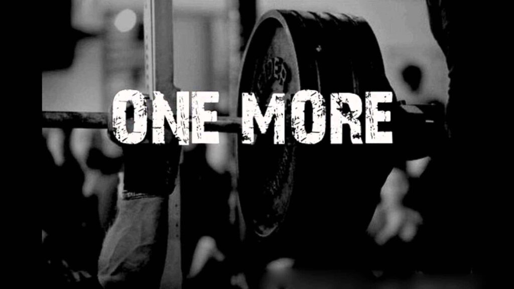 Empowering Weightlifting Wallpaper: ONE MORE for Workout Motivation