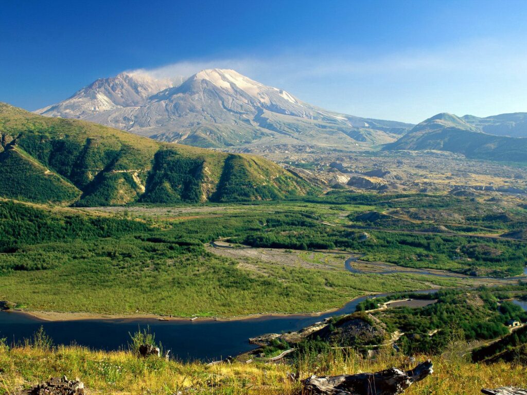 Mount St Helens panoramic view with green hills rugged slopes clear blue sky Pacific Northwest Wallpaper