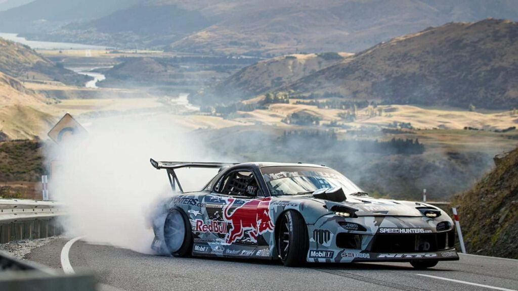Mountain Drift: Capturing the Power and Customization of the Mazda Rx 7 Wallpaper