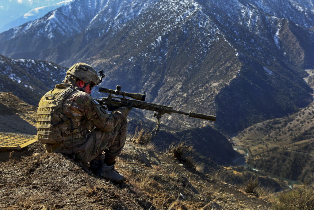 Mountain Warriors: Camouflaged Sniper with Barrett M82 Rifle - Majestic 4K Wallpaper