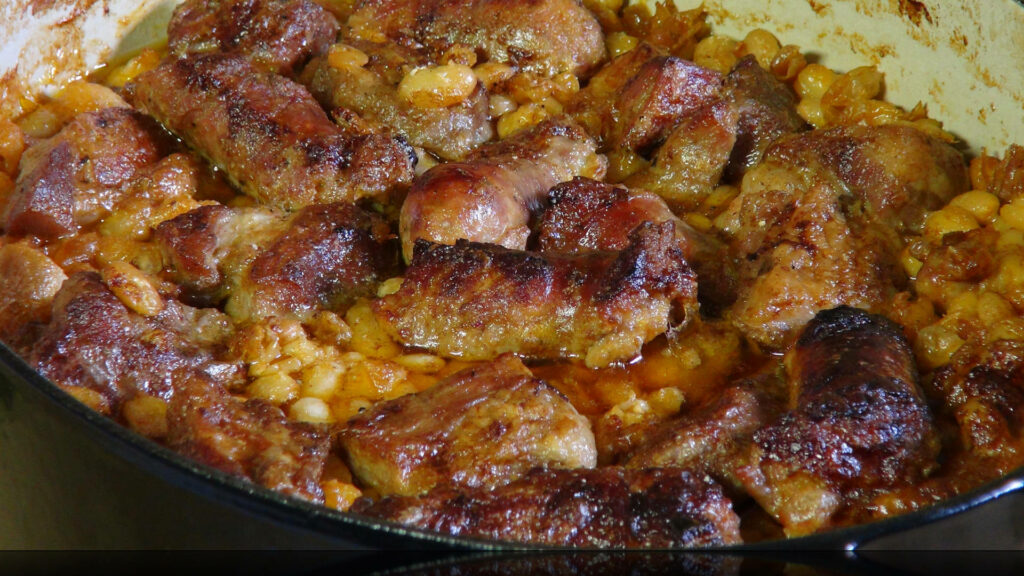 Classic Cassoulet Wallpaper: Rustic Sausage & Tender Beans Background