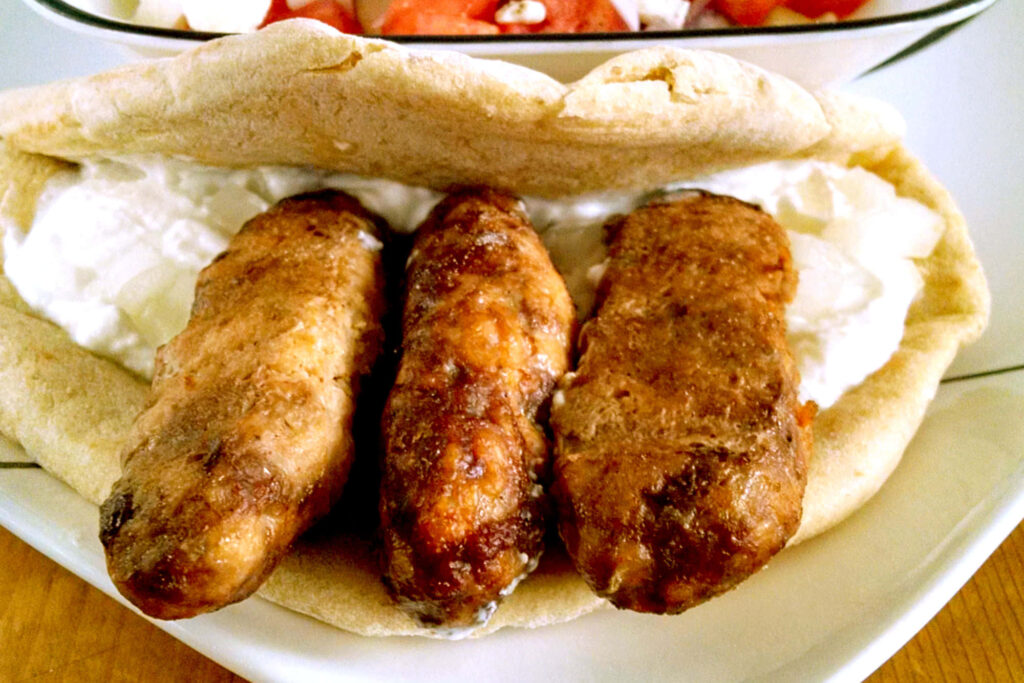 Mouthwatering Cevapi Pita Sandwich - Delicious Balkan Wallpaper