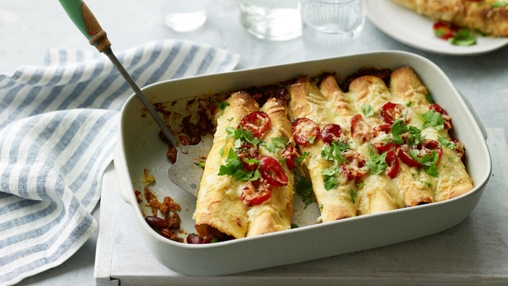 Cheesy Enchilada Rolls Wallpaper: Fresh Baked Delight & Colorful Toppings