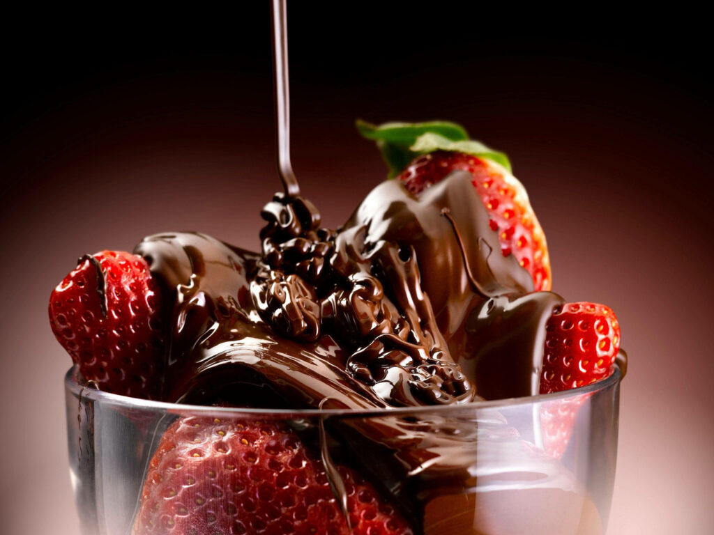 Tempting Dessert Delight of Chocolate-drenched Strawberries Wallpaper