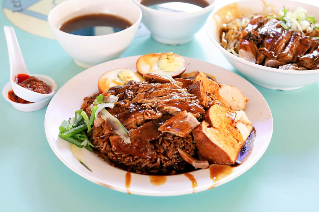 Mouthwatering Duck Rice Wallpaper with Braised Eggs & Tofu Background