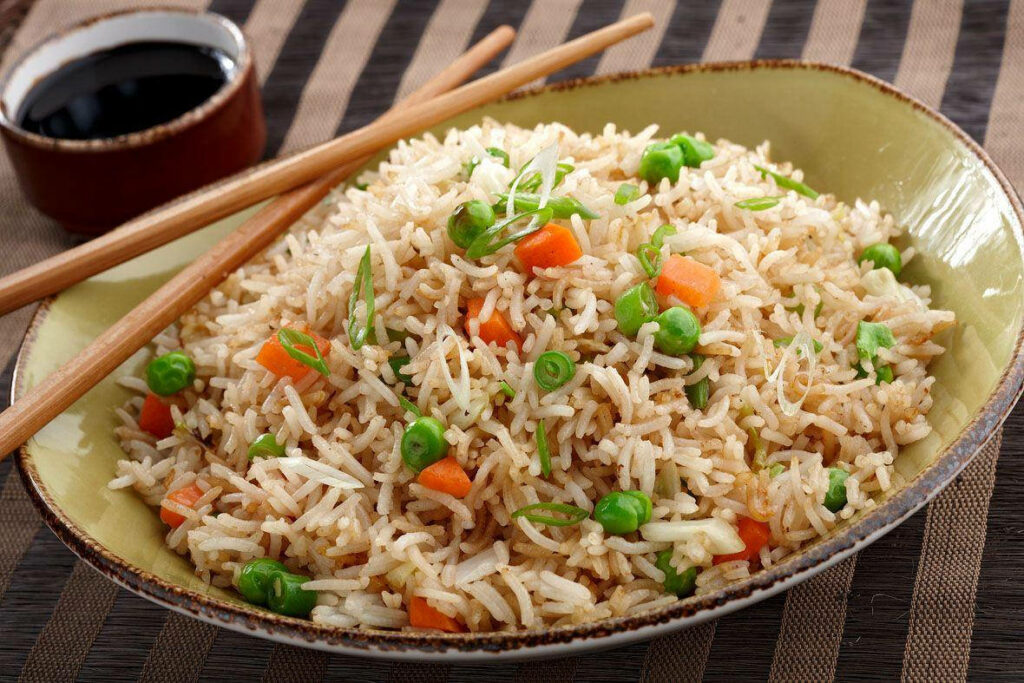 Delicious Fried Rice Wallpaper with Peas, Carrots & Soy Sauce