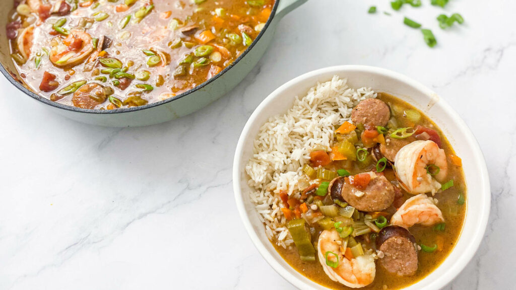 Delicious Gumbo Wallpaper: Shrimp & Sausage on Marble Background