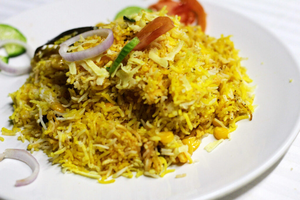 Vibrant Indian Biryani Wallpaper: Aromatic Rice & Fresh Vegetables
