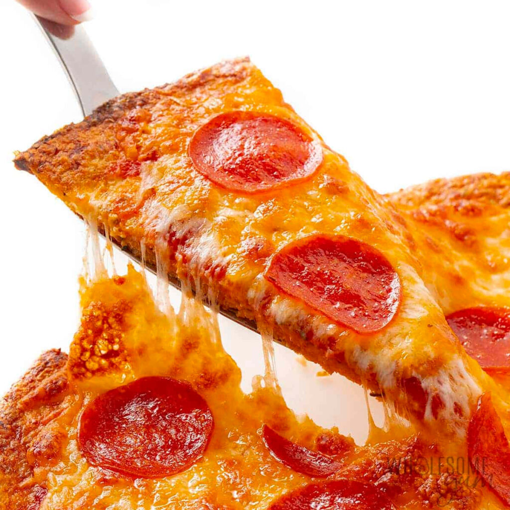 Hot and Cheesy Pepperoni Pizza Wallpaper: Mouthwatering Slice