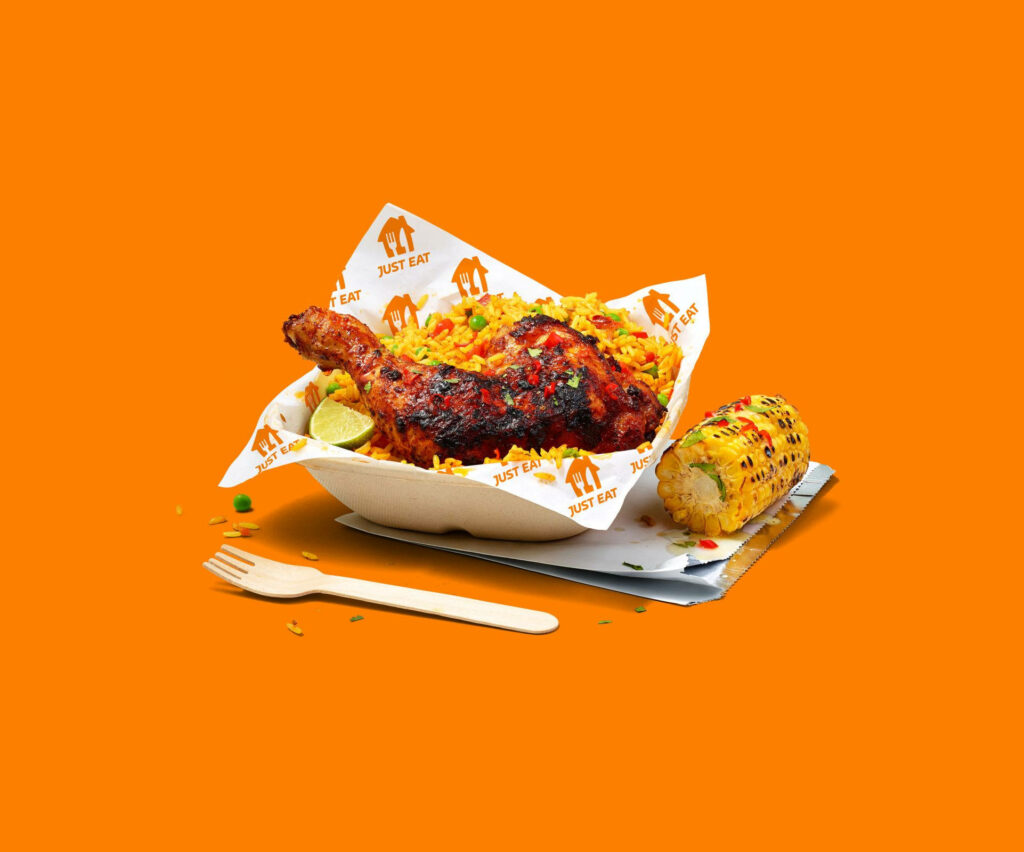 Vibrant Peri-Peri Chicken Wallpaper: Juicy Dish with Rice & Corn