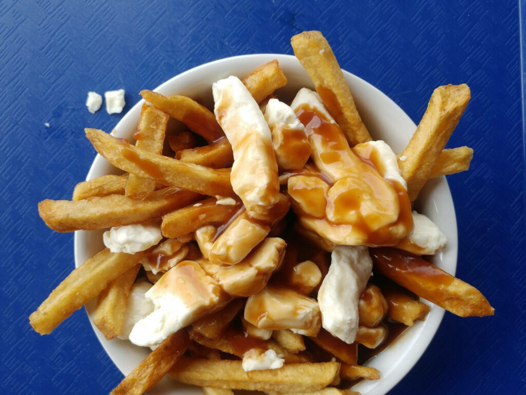 Homemade Poutine Wallpaper: Crispy Fries & Cheese Curds Delight