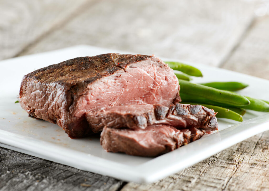 Succulent Roast Beef with Green Beans: Rustic Wallpaper Background
