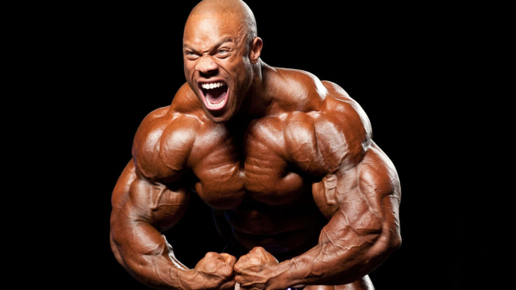 Mr Olympia 2014 muscular physique dramatic pose dark background intense bodybuilding wallpaper