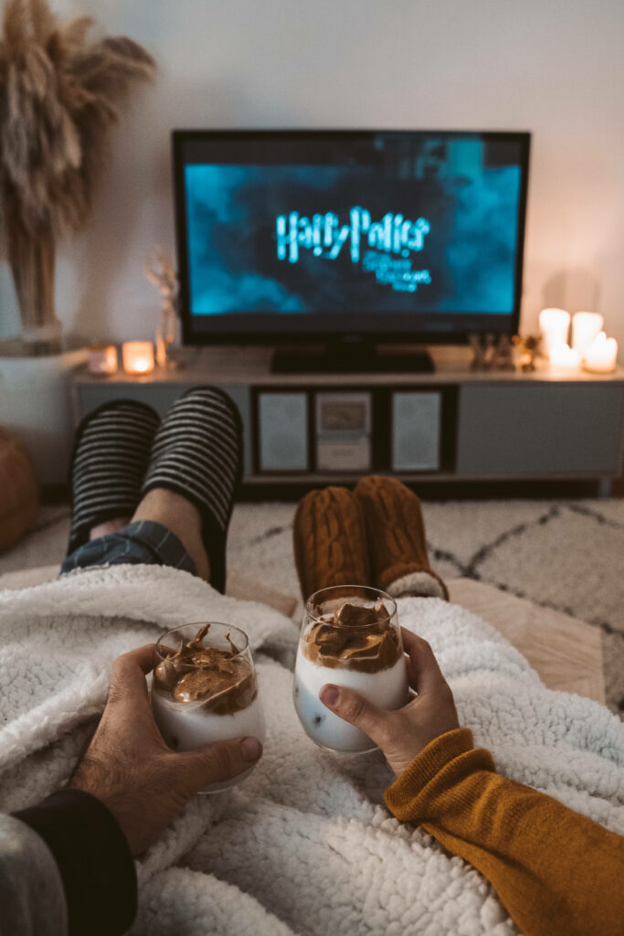 Cozy Movie Night with a Touch of Harry Potter Magic Wallpaper