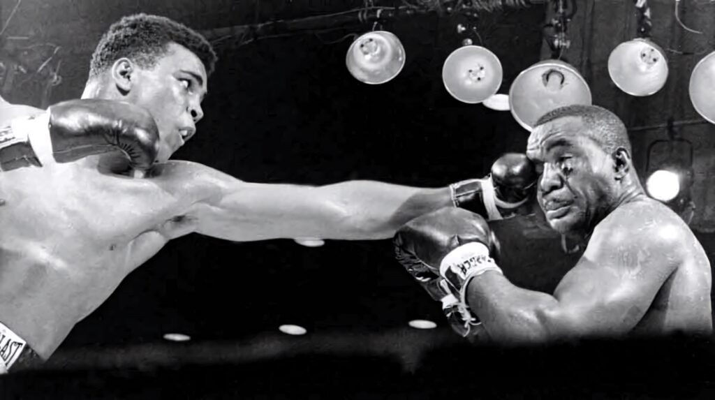 Iconic Boxing Wallpaper: Ali vs. Liston Legendary Punch Moment