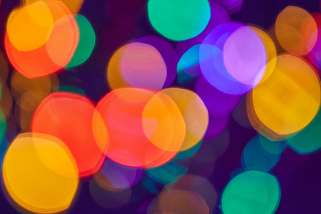 Colorful Circles and Blurred Spots: A Glaring Multi-Colored Wallpaper Background Photo