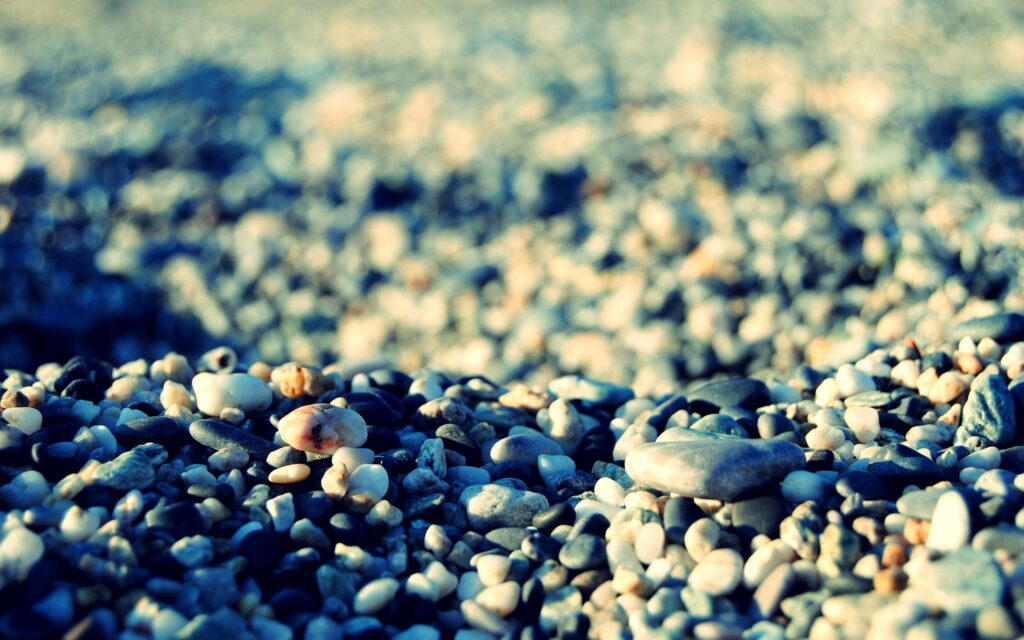 Textured Wallpaper: Close-Up of Multicolored Stone Surface