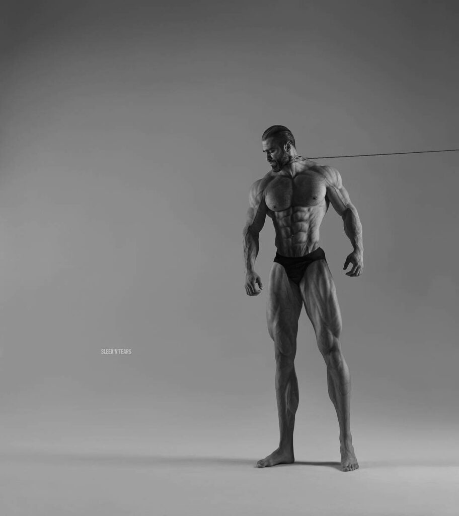 Muscular Model in Minimalist Monochrome: Bold Pose & Defined Physique Wallpaper