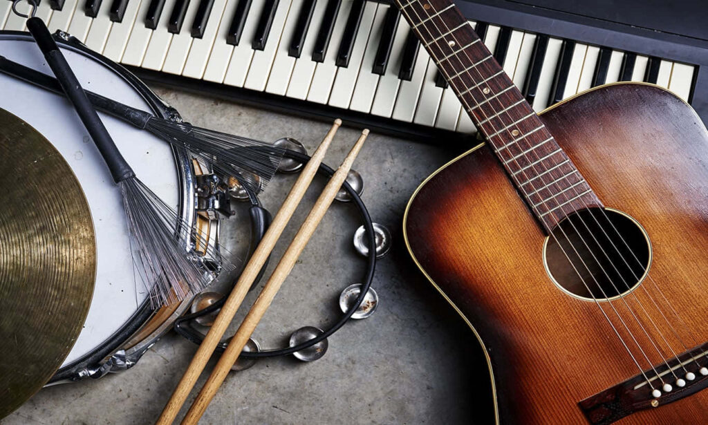 Musical Instruments Wallpaper: Acoustic Guitar & More on Textured Background